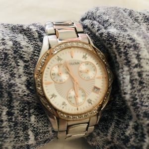 Bulova gold and sterling silver.